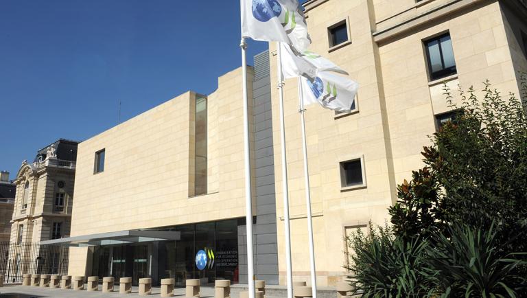 Front Entrance of OECD Conference Centre, including new flag poles.