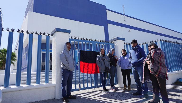 Employees of Mecanismos de Matamoros strike outside the company in Matamoros