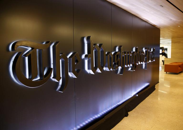 FILE PHOTO: Newspaper banner logo is seen during grand opening of Washington Post in Washington