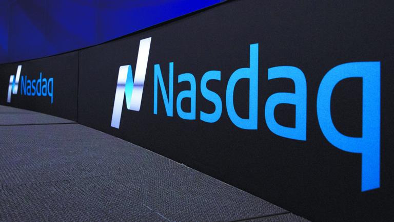 FILE PHOTO: The Nasdaq logo is displayed at the Nasdaq Market site in New York