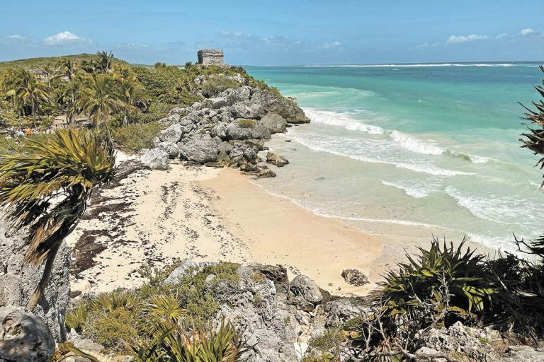 View at the Pre-Columbian Mayan site of Tulum, built on the eastern coast of the Yucatan Peninsula on the Caribbean Sea, in the Mexican state of Quintana Roo, on March 9, 2021. (Photo by Daniel SLIM / AFP)