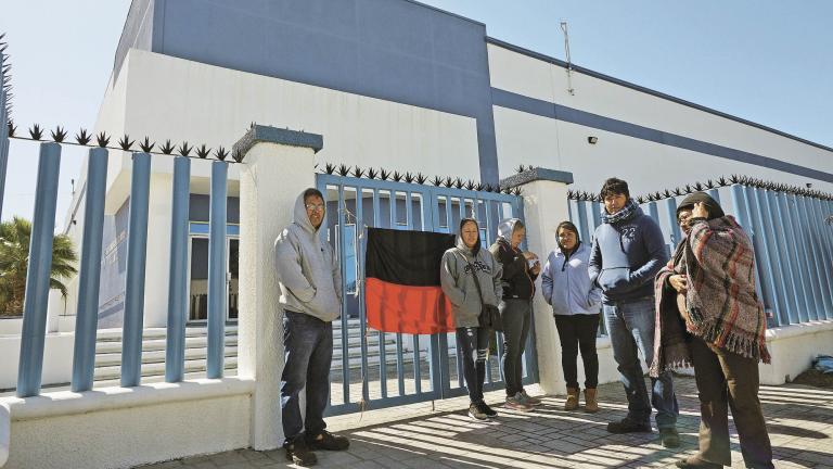 Employees of Mecanismos de Matamoros strike outside the company in Matamoros