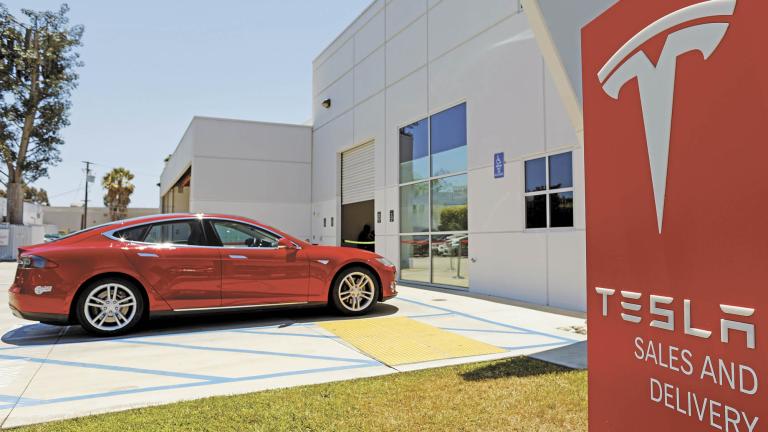 FILE PHOTO: A Tesla sales and service center is shown in Costa Mesa, California