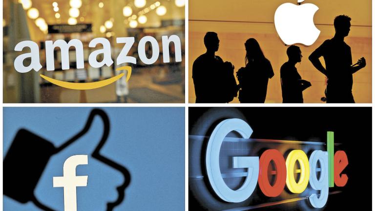 FILE PHOTO: The logos of Amazon, Apple, Facebook and Google