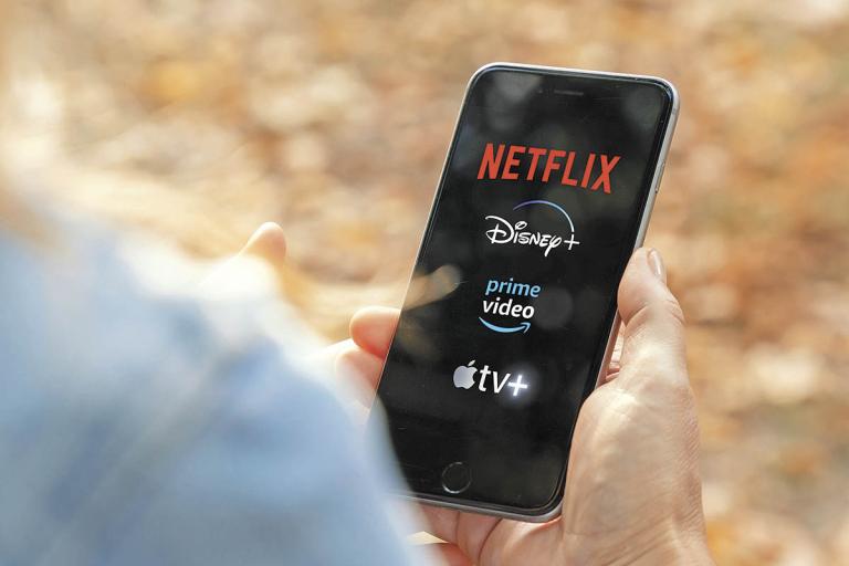 AACHEN, GERMANY - 10. September 2019 : Video Streaming apps like Disney plus, Apple TV plus, amazon prime and netflix on Apple iPhone.