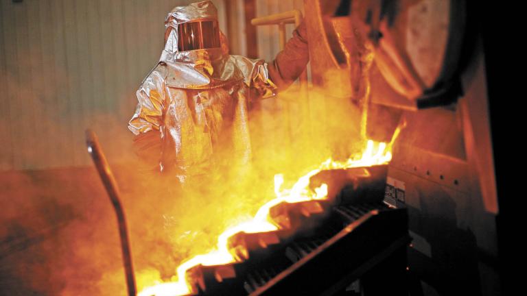 Gold is poured during a tour of Agnico-Eagle