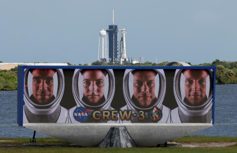 A SpaceX Falcon 9 rocket stands on the launch pad at the Kennedy Space Center in Cape Canaveral