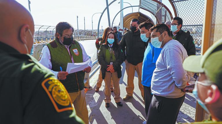 Migrants under the Migrant Protection Protocols (MPP) program are delivered by agents of the U.S Border Patrol to agents of the National Migration Institute of Mexico at the Lerdo-Stanton International Bridge in El Paso