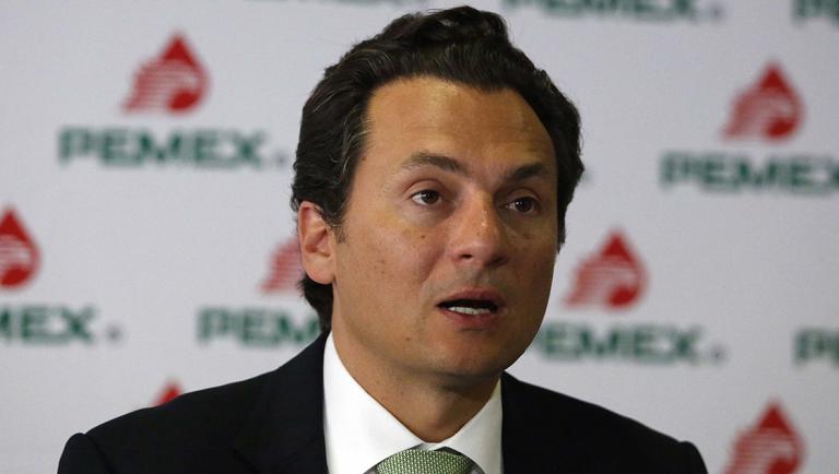 Mexican state-run oil company Pemex's Chief Executive Emilio Lozoya attends a news conference at Pemex headquarters in Mexico City June 4, 2014. Mexico's national oil company Pemex said it has sold most of its stake in Spain's Repsol SA for 2.09 billion euros ($2.9 billion) on Wednesday, and plans to unload the rest soon, ending a quarter-century partnership and freeing up cash to invest in its own energy sector. REUTERS/Bernardo Montoya (MEXICO - Tags: BUSINESS ENERGY)