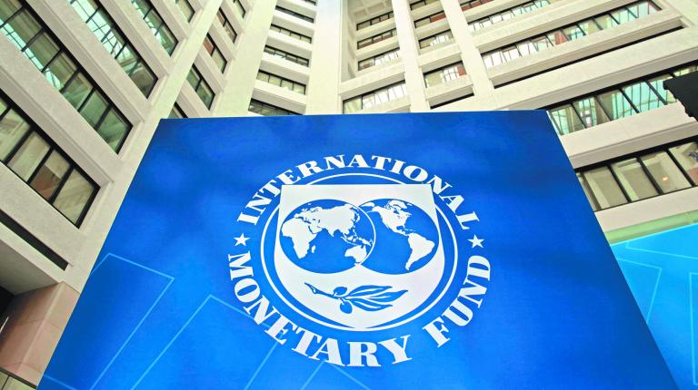 FILE PHOTO: FILE PHOTO: The International Monetary Fund logo is seen during the IMF/World Bank spring meetings in Washington, U.S., April 21, 2017. REUTERS/Yuri Gripas/File Photo-NARCH/NARCH30