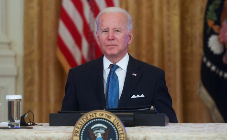 U.S. President Joe Biden listens to a question from Fox News reporter Peter Doocy