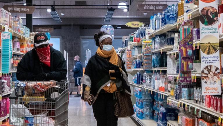 FILE PHOTO: Shoppers browse in a supermarket while wearing masks to help slow the spread of coronavirus disease (COVID-19) in north St. Louis, Missouri, U.S. April 4, 2020. Picture taken April 4, 2020.  REUTERS/Lawrence Bryant/File Photo-NARCH/NARCH30