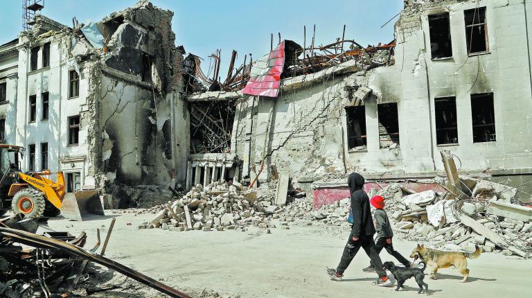 A view shows a destroyed theatre building in Mariupol