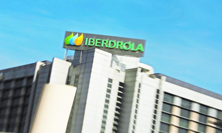 The logo of Spanish power company Iberdrola is seen on top of Iberdrola