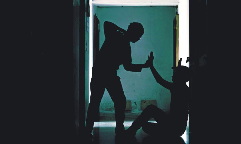 Silhouette,Young,Man,Being,Mugged,In,A,Dark,Alley,At