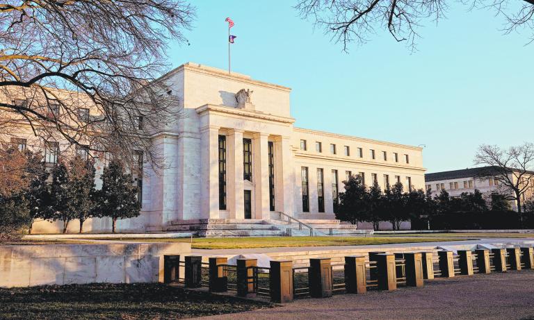 FILE PHOTO: The Federal Reserve building is seen before the Federal Reserve board is expected to signal plans to raise interest rates in March as it focuses on fighting inflation in Washington, U.S., January 26, 2022.      REUTERS/Joshua Roberts/File Photo-NARCH/NARCH30