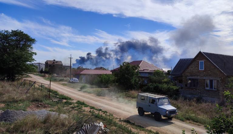 Smoke rises after explosions were heard near Novofedorivka