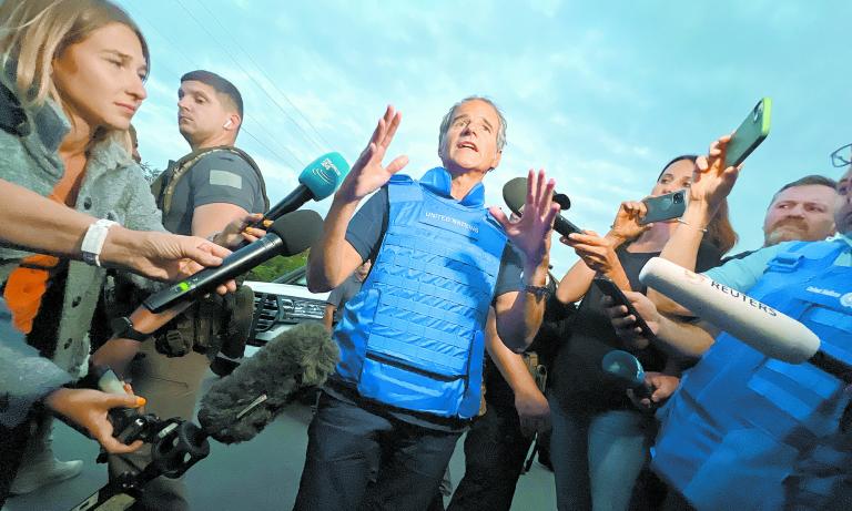 IAEA Director General Grossi speaks with journalists after he and part of the International Atomic Energy Agency (IAEA) mission came back from Zaporizhzhia nuclear power plant at Ukrainian checkpoint in Zaporizhzhia region