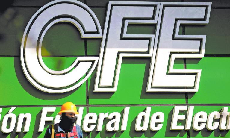 The logo of Mexico's state-run electric utility known as the Federal Electricity Commission (CFE), is pictured at its building office in Monterrey, Mexico February 9, 2021. REUTERS/Daniel Becerril