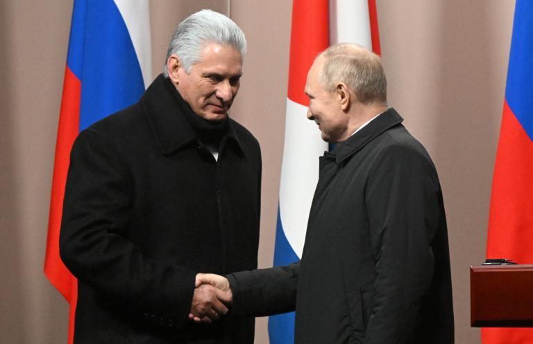 Russian President Vladimir Putin and his Cuban counterpart Miguel Mario Diaz-Canel unveil a monument to Fidel Castro in Moscow