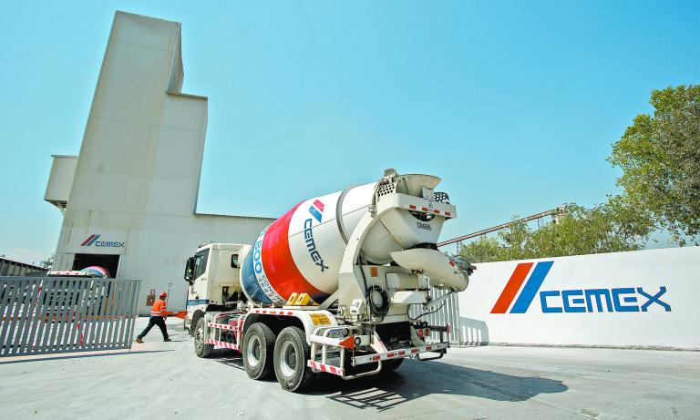 FILE PHOTO: A cement mixer truck arrives to a cement plant of Mexican cement maker CEMEX in Monterrey