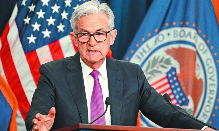 Federal Reserve Board Chairman Jerome Powell speaks during a news conference in Washington, DC, on July 27, 2022. - The US Federal Reserve on July 27 again raised the benchmark interest rate by three-quarters of a percentage point in its ongoing battle to tamp down raging price pressures that are squeezing American families. (Photo by MANDEL NGAN / AFP)