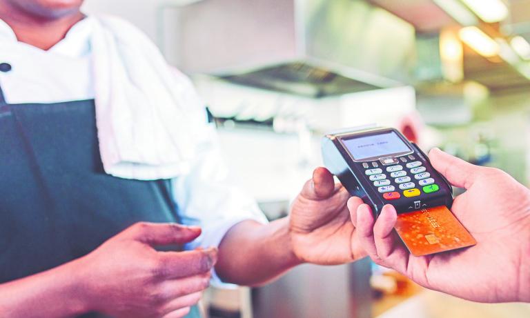 Hands,Of,Customer,Paying,Restaurant,Bill,Using,Credit,Card.,Customer