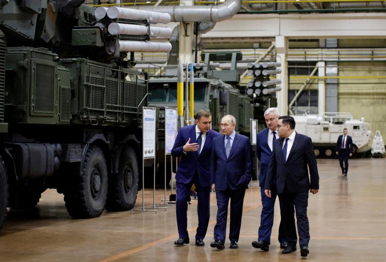 Russian President Vladimir Putin visits the Shcheglovsky Val machine building plant, in Tula