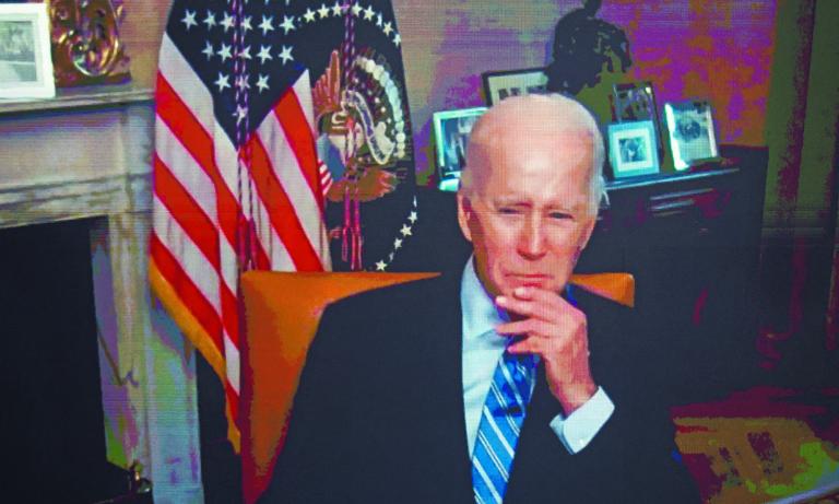 U.S. President Joe Biden, isolating following his COVID-19 diagnosis, appears virtually in a meeting with business and labor leaders about the Chips Act — relating to U.S. domestic chip and semiconductor manufacturing — in an auditorium on the White House campus in Washington, U.S., July 25, 2022. REUTERS/Jonathan Ernst