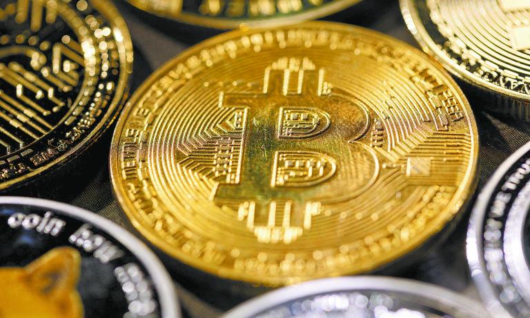 FILE PHOTO: Representation of cryptocurrency bitcoin is seen in this illustration taken November 29, 2021. REUTERS/Dado Ruvic/File Photo-NARCH/NARCH30