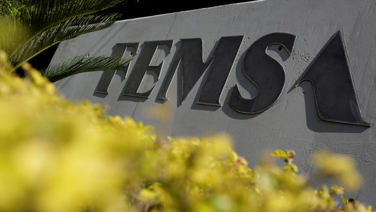 The logo of Coca Cola Femsa, the largest Coke bottler in the world, is pictured at its headquarters in Monterrey, Mexico, April 25, 2017. Picture taken April 25, 2017. REUTERS/Daniel Becerril