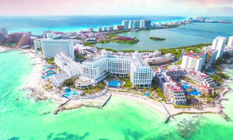 View of beautiful Hotels in the hotel zone of Cancun at sunset. Riviera Maya region in Quintana roo on Yucatan Peninsula