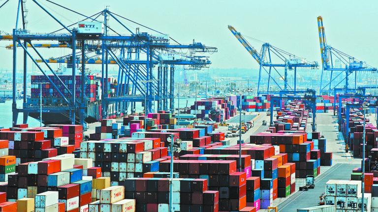 Ship and containers are shown at the port of Los Angeles in Los Angeles, California, U.S. July 16, 2018. REUTERS/Mike Blake