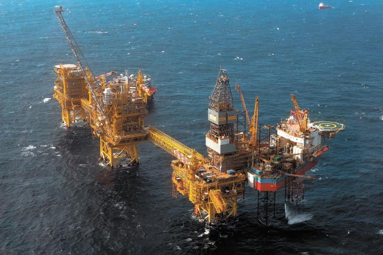 The Total Culzean platform is pictured on the North Sea, about 45 miles (70 kilometres) east of the Aberdeen, Europe's self-proclaimed oil capital on Scotland's northeast coast, on April 8, 2019. - Deep beneath the cold waters of the North Sea lies what French energy giant Total hopes will help feed Britain's voracious appetite for gas.  Total forecasts that the Culzean field, located more than 15,000 metres under the seabed halfway between Scotland and Norway, will cover five percent of Britain's gas requirements. (Photo by ANDY BUCHANAN / AFP) / TO GO WITH AFP STORY by Joseph SOTINEL-TO GO WITH AFP STORY by Joseph SOTINEL