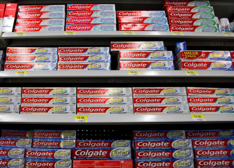 FILE PHOTO: Boxes of Colgate toothpaste are displayed on store shelves in Westminster