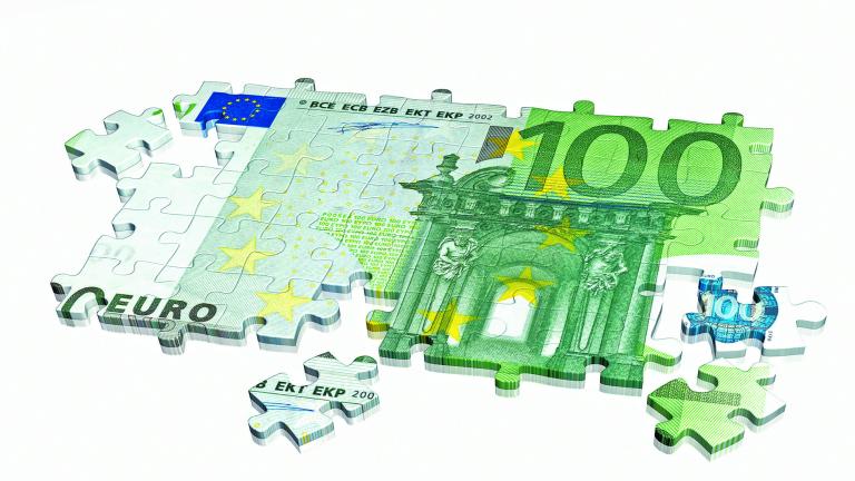 Collected,Puzzle,With,The,Image,Of,Euro