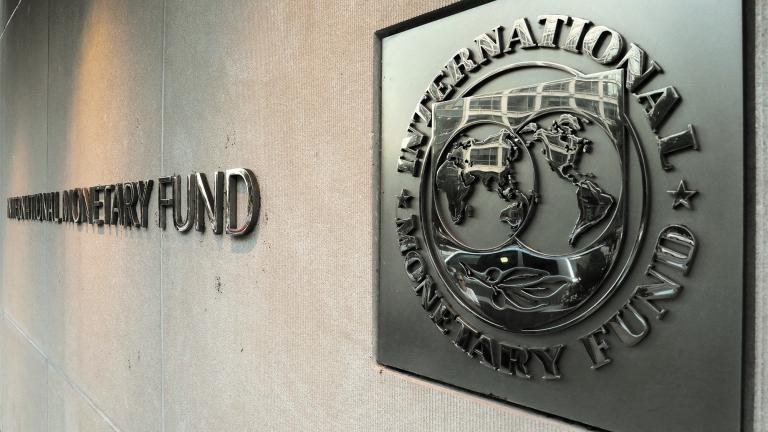 FILE PHOTO: IMF logo is seen outside the headquarters building in Washington