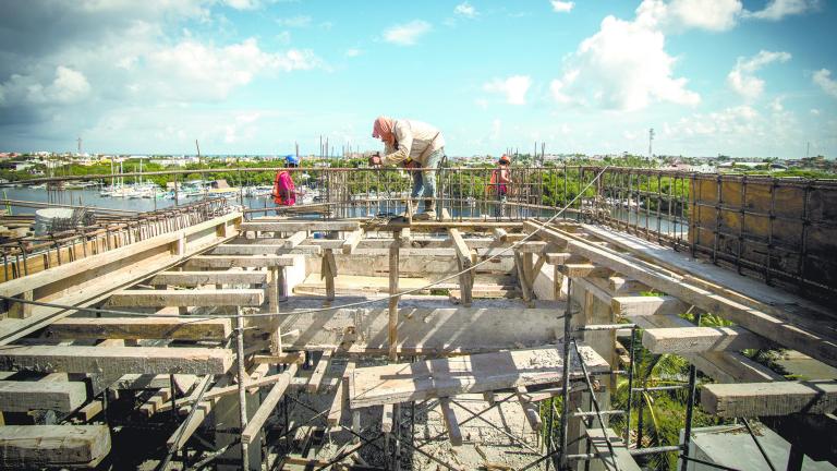 Mexican construction workers on construction site