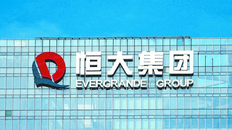 FILE PHOTO: The company logo is seen on the headquarters of China Evergrande Group in Shenzhen