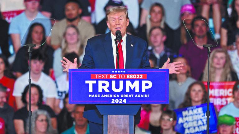 Former U.S. President Donald Trump attends a campaign event in Conway