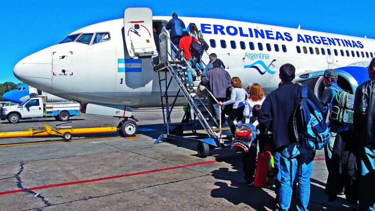 BUENOS AIRES - SEP 14: Aerolineas Argentinas jet at Ezeiza Airport on September 14, 2012 in Buenos Aires, Argentina. It is the only Latin American airport that operates flights to all continents.