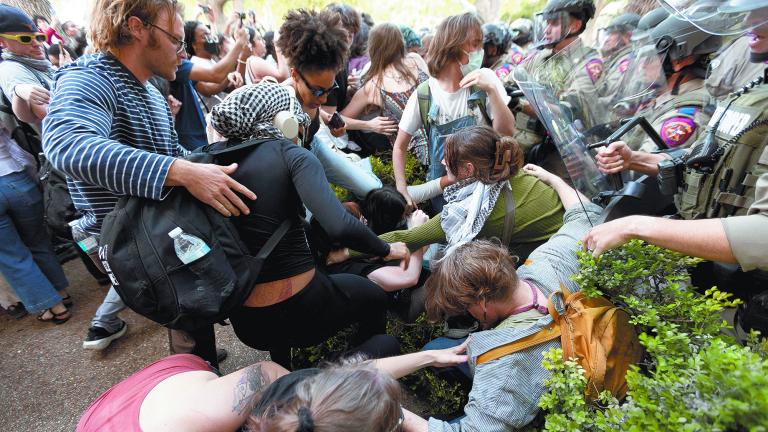 Pro-Palestinian protesters clash with law enforcements officers at the University of Texas