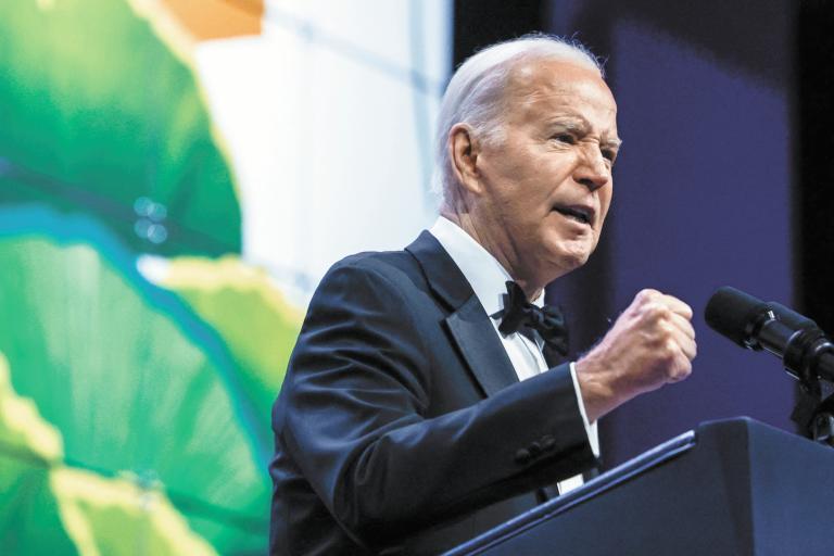 U.S. President Joe Biden delivers remarks at the Asian Pacific American Institute for Congressional Studies