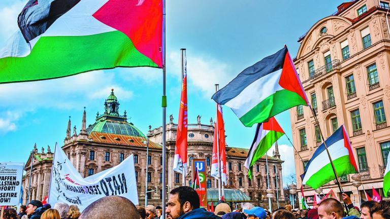 Munich,,Germany,-,February,17:,Protest,Banners,And,Activists,At