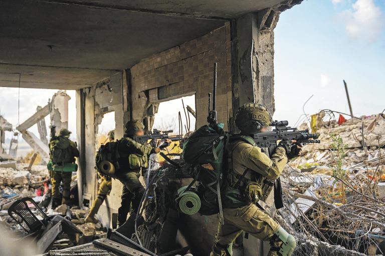 This handout picture released by the Israeli army on May 14, 2024 shows Israeli soldiers during military operations in the Gaza Strip, amid the ongoing conflict between Israel and the Palestinian militant group Hamas. (Photo by Israeli Army / AFP) / === RESTRICTED TO EDITORIAL USE - MANDATORY CREDIT