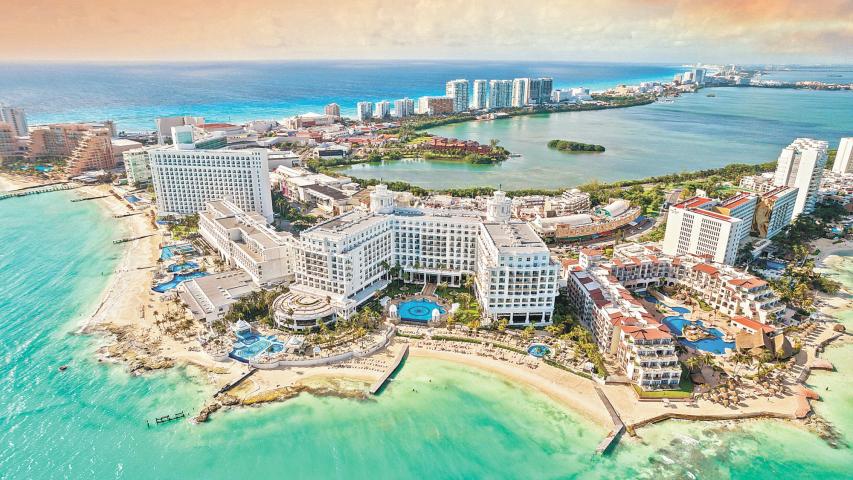 View of beautiful Hotels in the hotel zone of Cancun at sunset. Riviera Maya region in Quintana roo on Yucatan Peninsula