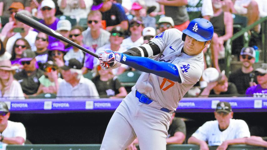 Sep 29, 2024; Denver, Colorado, USA; Los Angeles Dodgers two-way player Shohei Ohtani (17) swings the bat in the sixth inning against the Colorado Rockies at Coors Field. Mandatory Credit: Ron Chenoy-Imagn Images