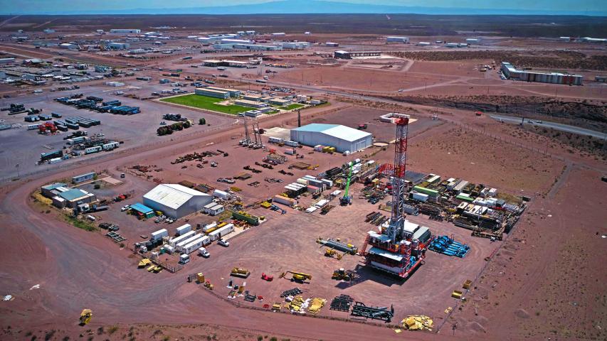 Aerial view of an industrial park, in Anelo, Neuquen province, Argentina, in the Vaca Muerta Formation, on November 28, 2019. Vaca Muerta is an enormous non-conventional oil and gas deposit nestled in a geologic formation. It occupies over 30,000 square kilometers in the states of Neuquen, Rio Negro, La Pampa and Mendoza and provides 43% of the total oil production and 60% of the gas production of Argentina. (Photo by Emiliano Lasalvia / AFP)