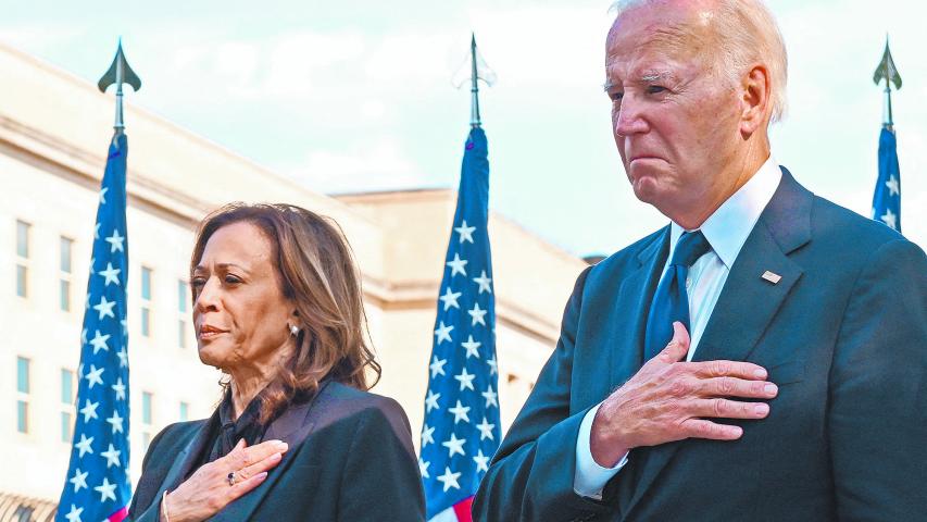 US President Joe Biden and US Vice President Kamala Harris participate in a wreath laying ceremony on the 23rd anniversary of the September 11 terror attack at the Pentagon in Arlington, Virginia on September 11, 2024. (Photo by ROBERTO SCHMIDT / AFP)