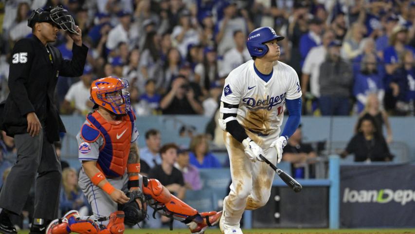 Oct 13, 2024; Los Angeles, California, USA; Los Angeles Dodgers two-way player Shohei Ohtani (17) hits a RBI double against the New York Mets in the fourth inning during game one of the NLCS for the 2024 MLB Playoffs at Dodger Stadium. Mandatory Credit: Jayne Kamin-Oncea-Imagn Images